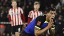 Pemian Tottenham Hotspur, Pedro Porto, tampak kecewa setelah ditaklukkan Sheffield United pada laga Piala FA di Stadion Bramall Lane, Kamis (2/3/2023). Spurs takluk dengan skor 0-1 dari Sheffield United. (AP Photo/Rui Vieira)