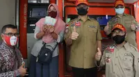 Menteri Sosial Juliari P Batubara dalam kunjungan kerja di DI Yogyakarta meninjau penyaluran Bansos Tunai Kemensos di Kantor Pos Wates, Kulon Progo, Yogyakarta, Rabu (19/8/2020). (Ist)