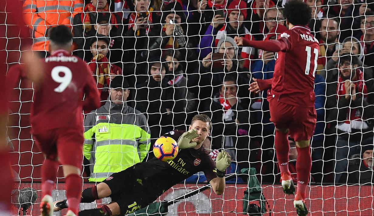 Arsenal. Mohamed salah mampu mencetak 8 gol dan 4 assist ke gawang Arsenal dari total 13 laga di semua ajang kompetisi. Dari 13 laga tersebut, Mohamed salah membawa Liverpool dan Chelsea 8 kali menang, 2 kali imbang dan 3 kali kalah. (AFP/Paul Ellis)
