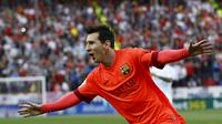 Selebrasi Lionel Messi usai cetak gol pertama untuk Barcelona (REUTERS/Marcelo del Pozo)