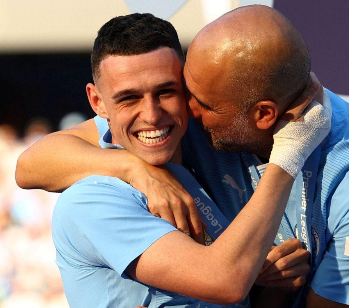 Josep Guardiola, menjadi pelatih pertama yang berhasil menjuarai Premier League empat musim secara beruntun. <br><br>Guardiola juga telah membawa City juara enam kali dalam delapan musim ia menangani tim ini.&nbsp;Foto: REUTERS<br>