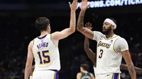 Selebrasi pemain Lakers saat mengalahkan Pistons di lanjutan NBA  (AP)