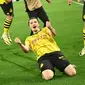 Gelandang Borussia Dortmund #20 Marcel Sabitzer merayakan gol keempat timnya yang dicetak ke gawang Atletico Madrid pada leg kedua perempat final Liga Champions 2023/2024 di Signal Iduna Park, Rabu (17/4/2024) dini hari WIB. (INA FASSBENDER / AFP)