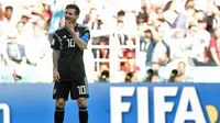 Ekspresi kekecewaan striker Timnas Argentina, Lionel Messi usai gagal mencetak gol lewat penalti ke gawang Timnas Islandia pada laga perdana Grup D Piala Dunia 2018. (Juan Mabromata / AFP)