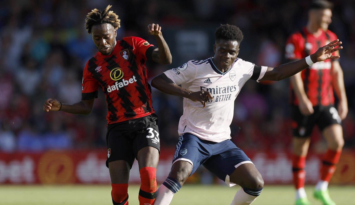 Setelah unggul dua gol Arsenal terus mendominasi permainan dengan penguasaan bola yang dominan di sepanjang babak pertama. Bournemouth pun dibuat tanpa peluang hingga tak satu pun tembakan mampu dlepaskan oleh Jordan Zemura dan kawan-kawan. (PA via AP/Steven Paston)