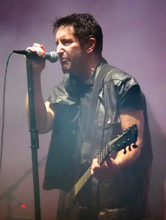 Trent Reznor dari Nine Inch Nails tampil pada hari ketiga Riot Fest 2022 di Douglass Park, Chicago, Amerika Serikat, 18 September 2022. (Photo by Rob Grabowski/Invision/AP)