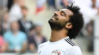 Ekspresi pemain Mesir, Mohamed Salah saat menghadapi Arab Saudi dalam Piala Dunia di Volgograd Arena, Volgograd, Rusia, 25 Juni 2018. Salah masuk dalam kandidat pemain terbaik FIFA 2018. (AFP PHOTO/Philippe DESMAZES)