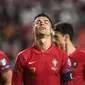 Cristiano Ronaldo. Ia hanya mampu membawa Portugal menempati posisi kedua Grup A di bawah Serbia dan harus memainkan laga play-off. Total telah tampil dalam 4 edisi Piala Dunia berurutan mulai 2006 hingga 2018 dengan mencetak 7 gol dan 2 assist dari 17 laga. (AFP/Patricia De Melo Moreira)