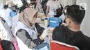Layanan vaksin Booster untuk warga yang ingin melengkapi persyaratan menghadiri Grand Launching Jakarta International Stadium (JIS), Papanggo, Jakarta Utara, Minggu (24/7/2022). (Liputan6.com/Iqbal S. Nugroho)
