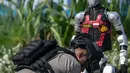 Langkah ini juga bertujuan untuk meningkatkan perlindungan dan pelayanan kepada masyarakat serta mengurangi risiko bagi personel di lapangan. (BAY ISMOYO/AFP)