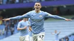 Phil Foden. Dengan nilai mencapai 190,2 juta euro, gelandang Manchester City ini menjadi pemain termahal menurut studi ini. Usia yang baru menginjak 21 tahun dan mampu membawa Manchester City merebut dua gelar musim ini jadi bukti kelayakannya. (AFP/Peter Powell/Pool)