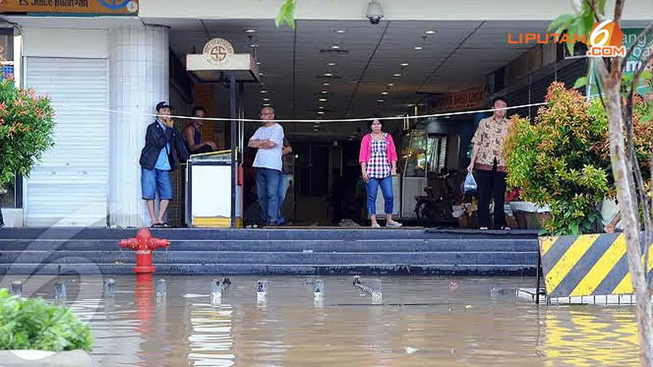 banjir-psbaru-3-140123.jpg