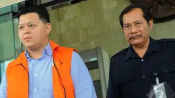 Teddy diperiksa penyidik KPK sekitar 3 jam. Ia keluar gedung KPK pada pukul 14.00 WIB dan langsung dibawa kembali ke rutan KPK, Jakarta, Selasa (22/7/2014)(Liputan6.com/Faisal R Syam)