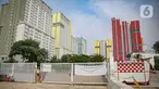 Suasana di RSDC Wisma Atlet Kemayoran, Jakarta, Jumat (17/15/2021). Rumah Sakit Darurat Covid-19 (RSDC) Wisma Atlet Kemayoran memberlakukan lockdown menyusul temuan adanya petugas kebersihan di tempat itu yang terpapar varian baru corona B.1.1.529 atau Omicron. (Liputan6.com/Faizal Fanani)