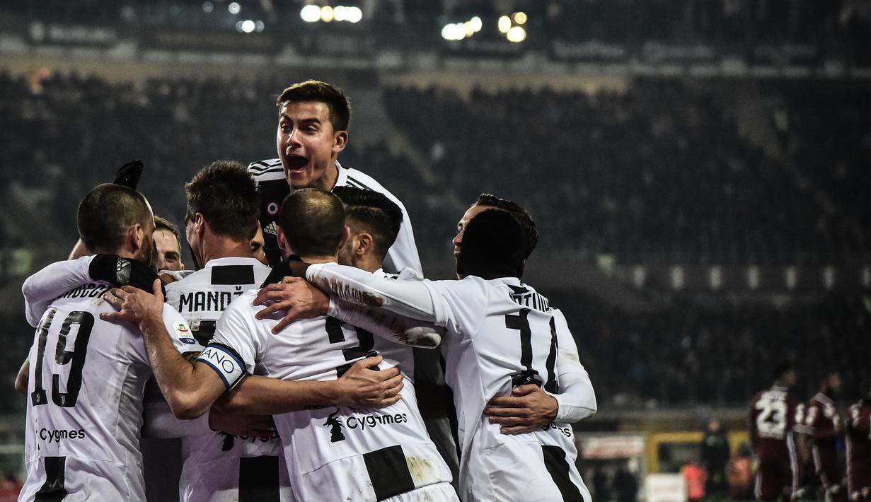 1. Juventus -Si Nyonya Tua yang terus mendominasi Serie A hingga pekan ke-16. Merekrut Ronaldo membuat mereka semakin perkasa di puncak tak terkalahkan. (AFP/Marco Bertorello)