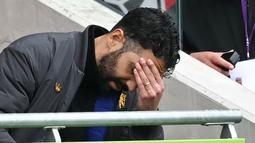 Pelatih Manchester United, Ruben Amorim, tampak kecewa setelah anak asuhnya ditaklukkan Brentford 1-3 pada pertandingan pekan keenam Liga Inggris 2025/2026 di Gtech Community Stadium, Sabtu (27/09/2025). (AFP/Justin Tallis)