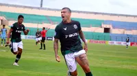 Selebrasi striker Persikabo 1973, Ciro Alves, usai membobol gawang Persela Lamongan dalam lanjutan BRI Liga 1 2021/2022 di Stadion Sultan Agung, Bantul, Sabtu (27/11/2021). (Bola.com/Nandang Permana)