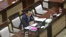 Wakil Menteri Keuangan yang juga Calon Deputi Gubernur Bank Indonesia, Thomas Djiwandono saat mengikuti uji kelayakan dan kepatutan di ruang Komisi XI Dewan Perwakilan Rakyat Republik Indonesia di Kompleks Parlemen, Senayan, Jakarta, Senin (26/1/2026). (Merdeka.com/Arie Basuki)