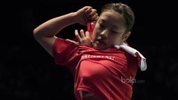 Ritual ganti baju selalu dilakukan oleh Nozomi Okuhara saat dirinya bertanding. (Bola.com/Vitalis Yogi Trisna)