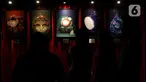 Pengunjung mengunjungi pameran seni karakter hantu atau Ghostival 2023 di Mal Senayan City, Jakarta, Senin (26/6/2023). (Liputan6.com/Herman Zakharia)