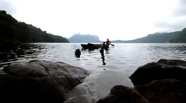 Danau Gunung Tujuh terletak di Kabupaten Kerinci atau tepatnya di Desa Pelompek, Kecamatan Ayu Aro, Jambi. Gunung Tujuh termasuk dalam Taman Nasional Kerinci Seblat yang merupakan Situs Warisan Dunia UNESCO, (17/5/2015). (Liputan6.com/Helmi Fithriansyah)