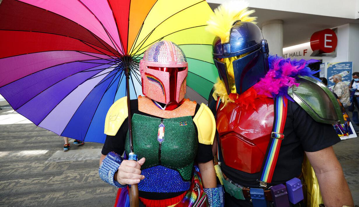 Cosplayer di Comic-Con San Diego tampil dengan dandanan sebagai Mandalorian. (Christy Radecic/Invision/AP)
