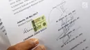 Perwakilan Advokat Peduli Kebangsaan menunjukan surat kuasa dari putri bungsu Wapres Jusuf Kalla, Chairani Kalla, di Bareskrim Polri, Senin (29/5). Keluarga JK melaporkan Silfester Matutina atas dugaan pencemaran nama baik (Liputan6.com/Immanuel Antonius)