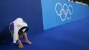 Nikita Nagornyy, dari Komite Olimpiade Rusia, bereaksi setelah memenangkan medali emas pada final tim artistik putra Olimpiade Tokyo 2020 , pada 26 Juli 2021, di Tokyo. (AP Photo Gregory Bull)