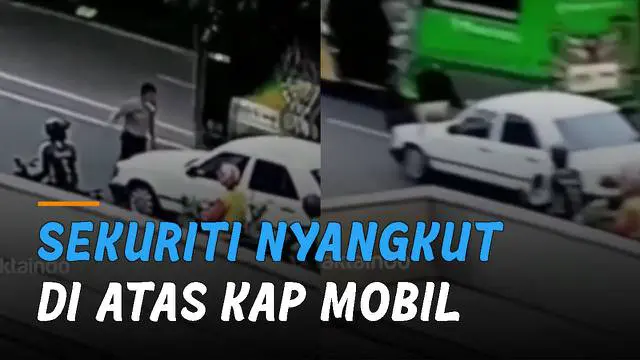 Detik-detik sekuriti nyangkut di atas kap mobil saat sedang atur lalu lintas. Kejadian itu terjadi di Jalan Pattimura, Kecamatan Medan Baru.