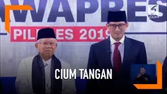 Momen unik tercipta setelah debat cawapres, Sandiaga Uno mencium tangan Ma'ruf Amin.