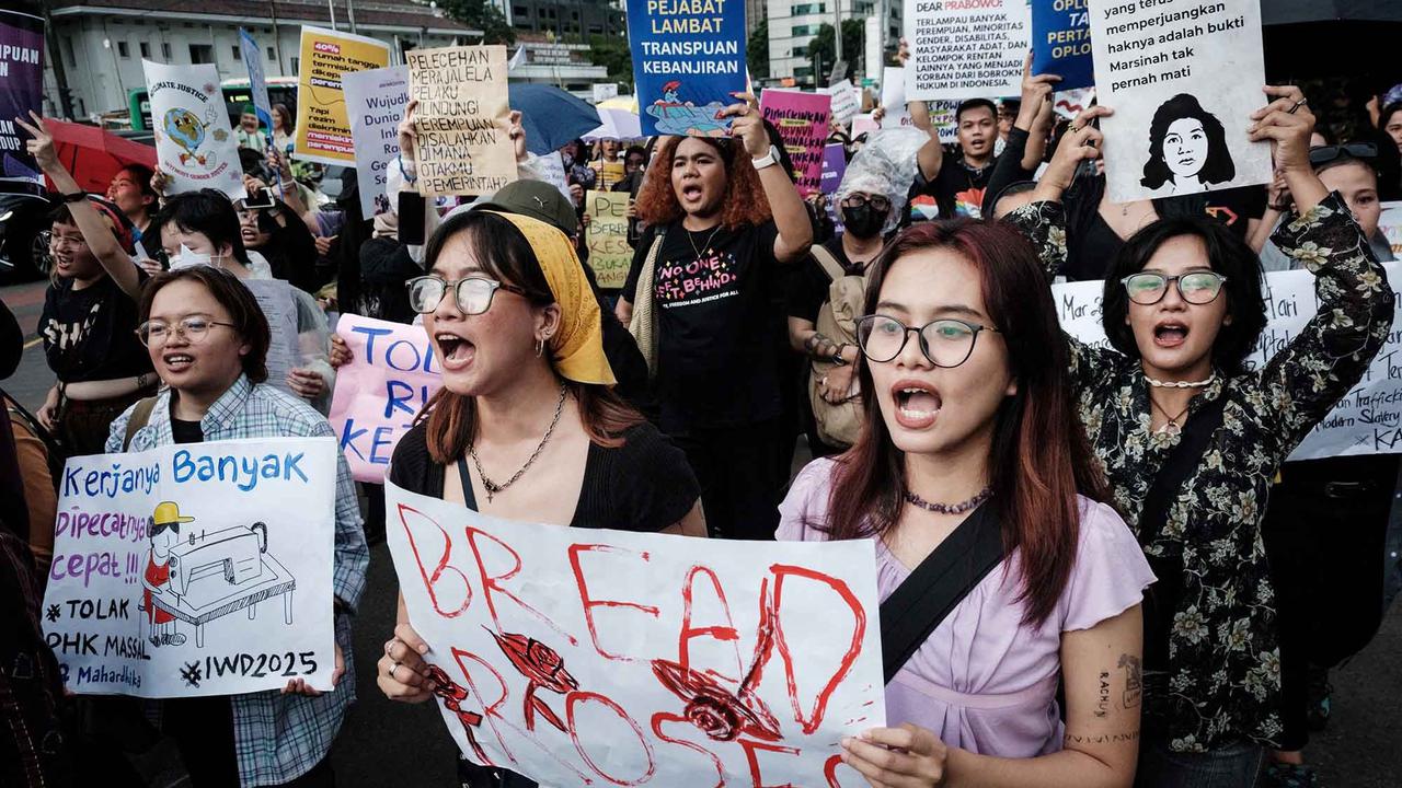 FOTO:  Peringati Hari Perempuan Sedunia, Aktivis Perempuan Mengampanyekan Stop Kekerasan Terhadap Perempuan