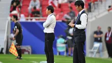 Pelatih Timnas Jepang, Hajime Moriyasu, mencatat selama pertandingan Grup D Piala Asia AFC Qatar 2023 antara Jepang dan Indonesia di Stadion Al-Thumama di Doha pada 24 Januari 2024. (HECTOR RETAMAL/AFP)