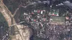 Foto satelit menunjukkan jalan banjir, ladang dan kota utama Nosy Varika di Madagaskar setelah Topan Batsirai pada Rabu, 7 Februari 2022. Puluhan orang dilaporkan tewas dan sedikitnya 55 ribu warga kehilangan tempat tinggal akibat Topan Batsirai. (Satellite image ©2022 Maxar Technologies via AP)