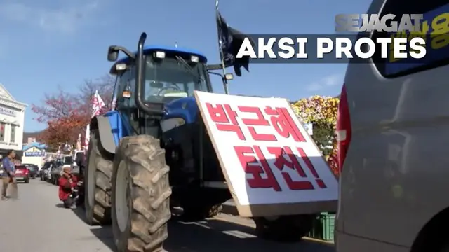 Ratausan P[etani Korea Selatan menggelar demo kepada presiden Korea Selatan . Demo dilakukan dengan mengendari traktor ke jalan raya