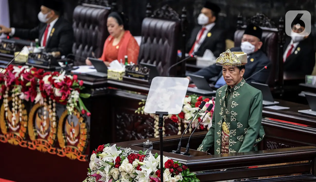 Presiden Joko Widodo menyampaikan pidato kenegaraan pada Sidang Tahunan MPR dan Sidang Bersama DPR - DPD Tahun 2022 di Gedung Nusantara, Kompleks Parlemen, Senayan, Jakarta, Selasa (16/8/2022). Jokowi menyampaikan pidato kenegaraan dalam sidang tahunan MPR RI dan sidang bersama DPR RI dan DPD RI Tahun 2022. (Liputan6.com/Johan Tallo)