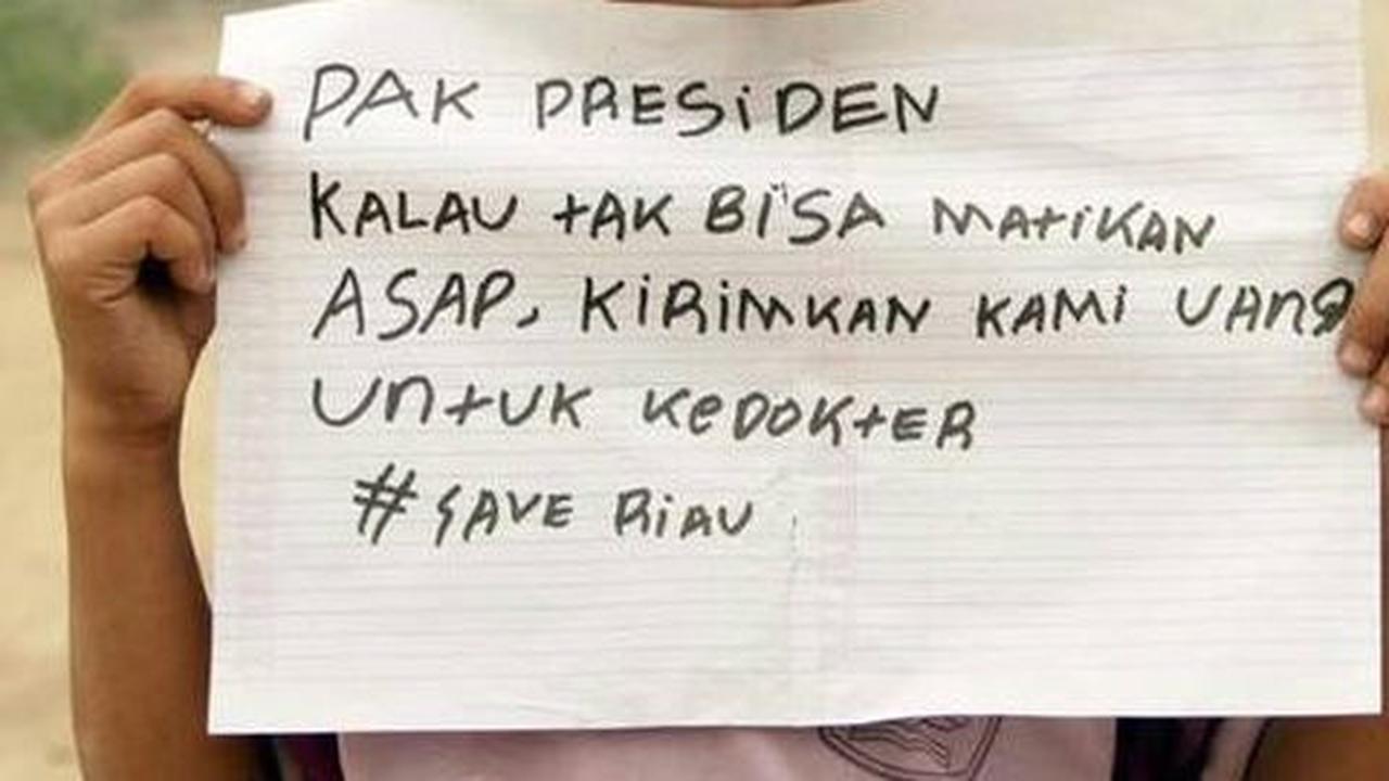Pak presiden kalau tak bisa matikan asap, kirimkan kami uang