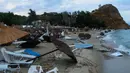 Kerusakan terlihat setelah badai menerjang Desa Nea Plagia, Halkidiki, Yunani, Kamis (11/7/2019). Puluhan orang dilaporkan terluka karena terjangan badai di wilayah Halkidiki. (Giannis Moisiadis/InTime News via AP)