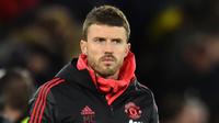 7. Michael Carrick - Berstatus sebagai staf pelatih di Manchester United membuatnya punya kans untuk mejadi pengganti Solskjaer. Kedekatan nya dengan para pemain bisa membuatnya diterima sebagai pelatih. (AFP/Glyn Kirk)