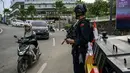 Personil korps Brimob Polri ikut dalam operasi pengamanan KTT Perhimpunan Bangsa Bangsa Asia Tenggara (ASEAN) di Labuan Bajo, NTT, Selasa (9/5/2023). (Photo by BAY ISMOYO / POOL / AFP)