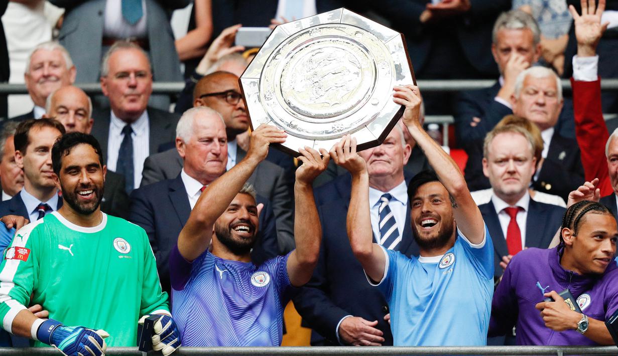 Sergio Aguero dan David Silva - Kombinasi duo Manchester City ini masuk dalam daftar duet lini serang berbahaya di Liga Inggris. Kekompakan kedua pemain ini telah menghasilkan 29 gol. (AFP/Adrian Dennis)