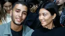 Lalu, foto Younes Bendjima yang bermesraan dengan wanita lain di Meksiko pun tersebar meski Younes membantahnya lewat akun Instagram. (Getty Images - Elle)