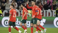 Cristiano Ronaldo merayakan gol keduanya untuk Portugal dalam pertandingan semifinal Nations League melawan Jerman di Munich Football Arena (AP Photo/Martin Meissner)