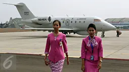 Pesawat Boeing MSA N614BA bersiap sebelum uji terbang di Lanud Halim Perdanakusuma, Jakarta, Rabu (4/11). Uji terbang dengan pesawat Boeing MSA N614BA tersebut dilakukan untuk mengawasi perairan Indonesia. (Liputan6.com/Immanuel Antonius)
