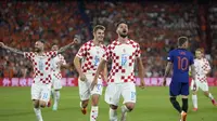 Ekspresi pemain Kroasia, Bruno Petkovic usai mencetak gol ke gawang Belanda pada semifinal UEFA Nations League 2023 di Stadion De Kuip, Kamis (15/6/2023) dini hari WIB. (AP Photo/Peter Dejong)