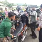 Anggota Polres Gorontalo saat mengamankan puluhan ranmor balapan liar (Arfandi Ibrahim/Liputan6.com)