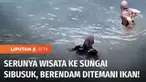 Yang berikutnya masih seputar air, tapi bukan banjir-banjiran. Kami ajak Anda healing sejenak dengan berendam di air sungai yang jernih membiru. Di sini wisatawan bisa berenang.