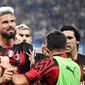 Pemain AC Milan Olivier Giroud (tengah) melakukan selebrasi usai mencetak gol ke gawang Sampdoria pada pertandingan sepak bola Serie A Liga Italia di Genova, Italia, 10 September 2022. AC Milan menang dengan skor 2-1 atas Sampdoria. (Tano Pecoraro/LaPresse via AP)