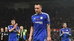 Pemain Chelsea, John Terry dan rekan-rekannya tertunduk lesu usai kalah dari Stoke City pada lanjutan Liga Premier Inggris di Stadion Britannia, Stoke, Minggu, (8/11/2015) dini hari WIB.  (AFP Photo/Paul Ellis)