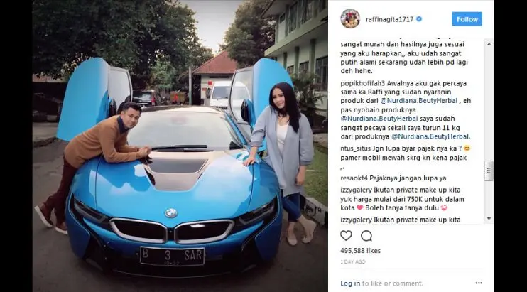Raffi Ahmad dan Nagita Slavina berpose dengan BMW i8. (Instagram/ raffinagita1717)