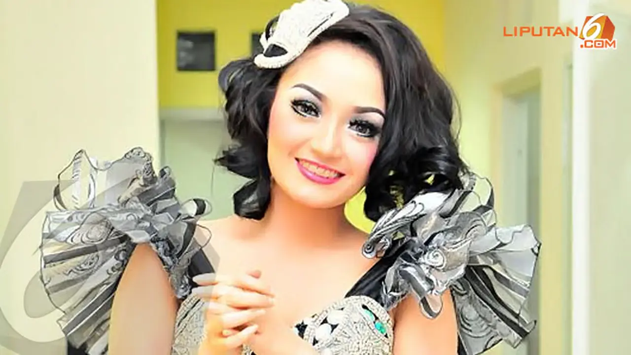 siti-badriah-131212b.jpg